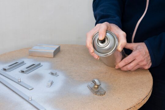 Refresh Dull Cabinet Handles with Spray Paint in 30 Minutes